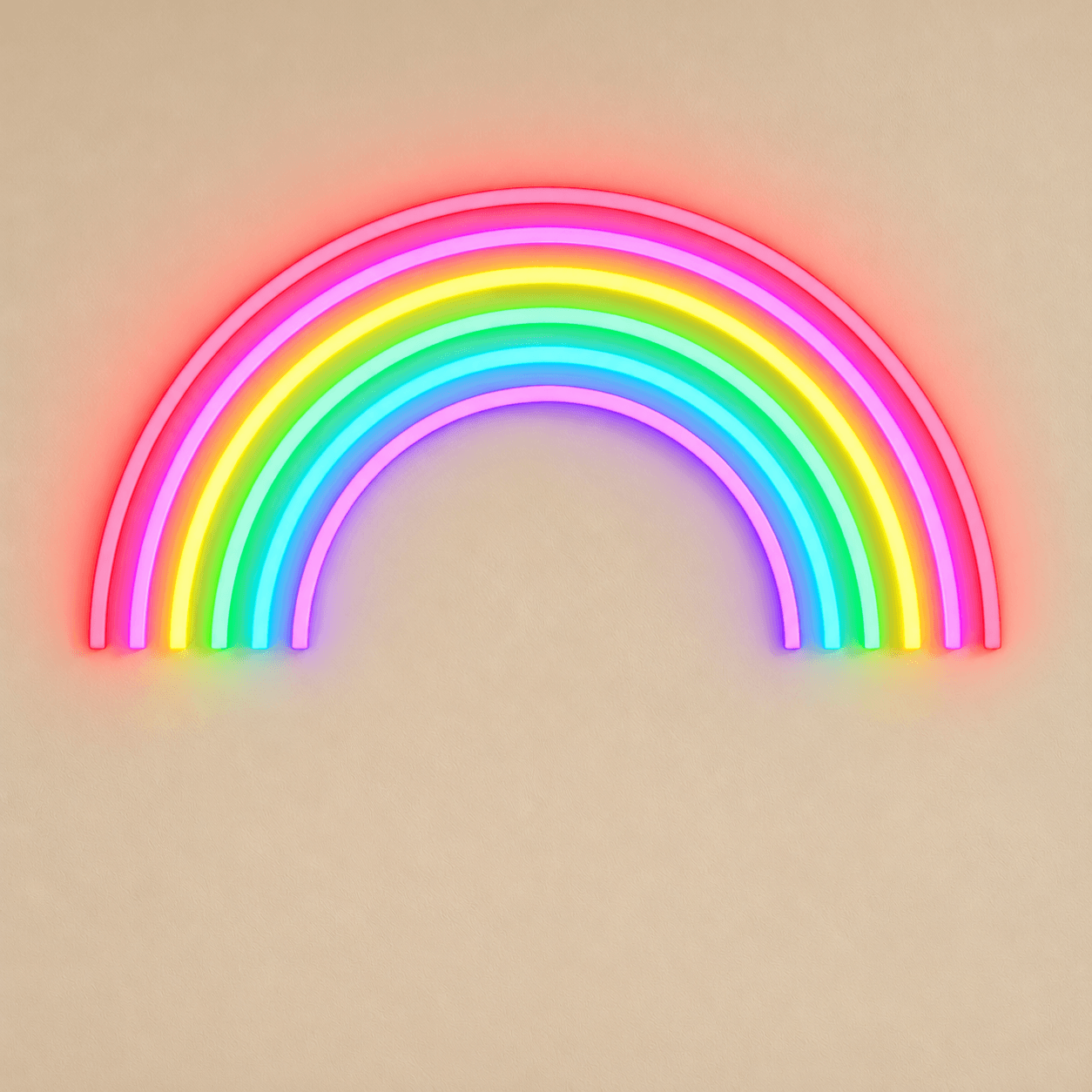 Glowing rainbow neon on cream wall.png