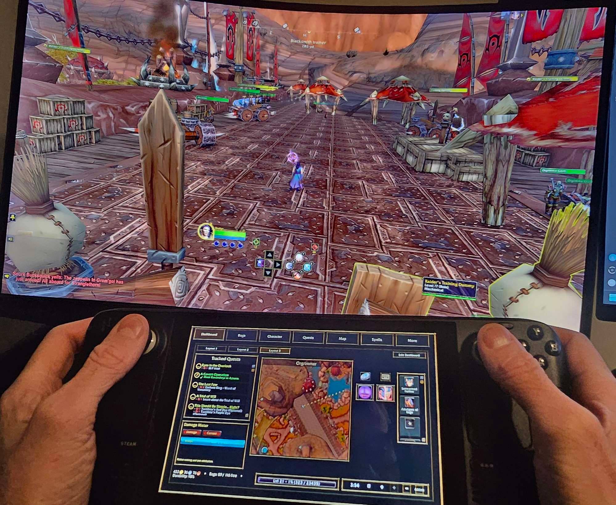 Thumbnail Main-screen gameplay with WoWU running on a handheld touchscreen.