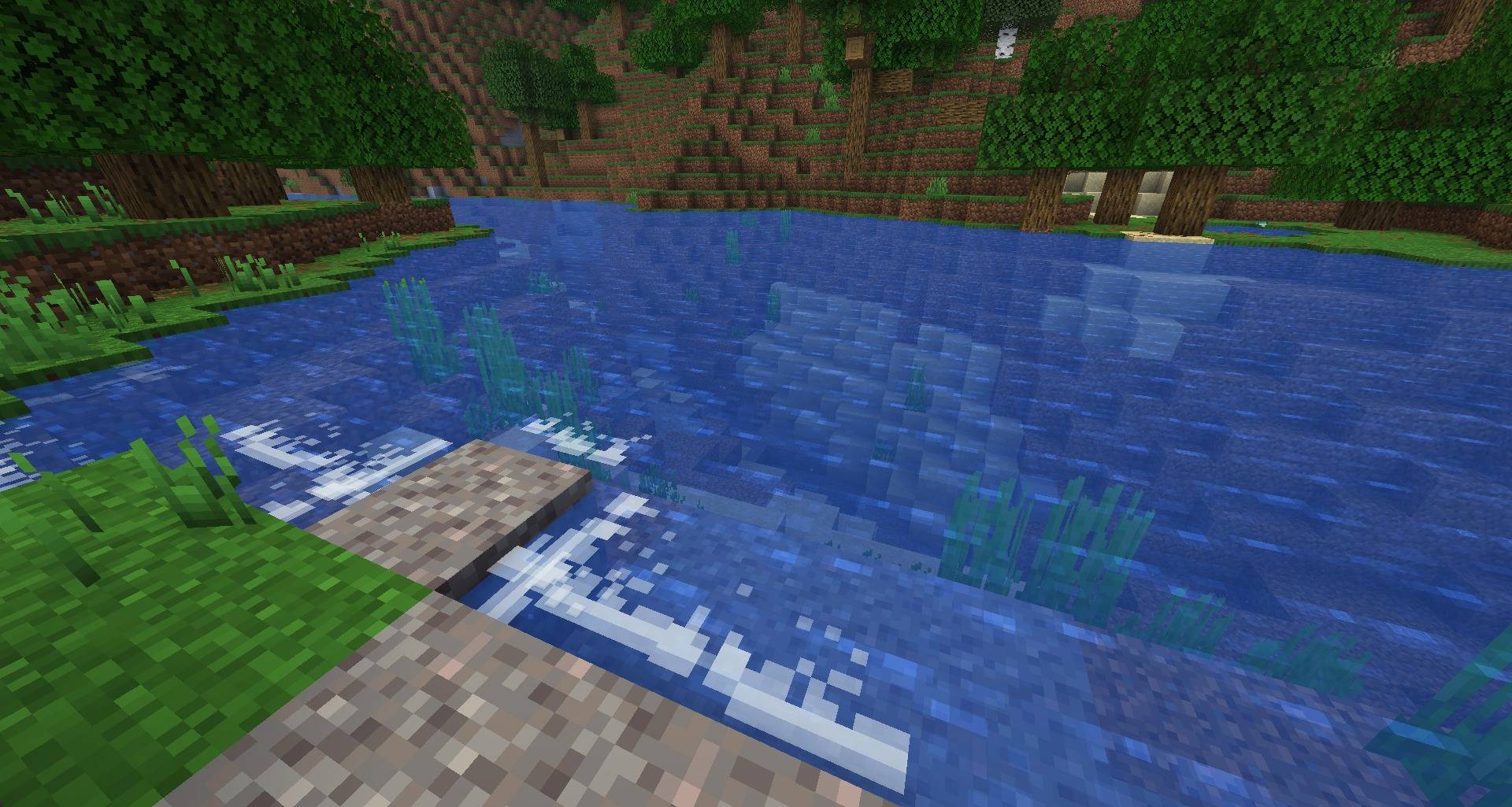 Surf foam along a river shore