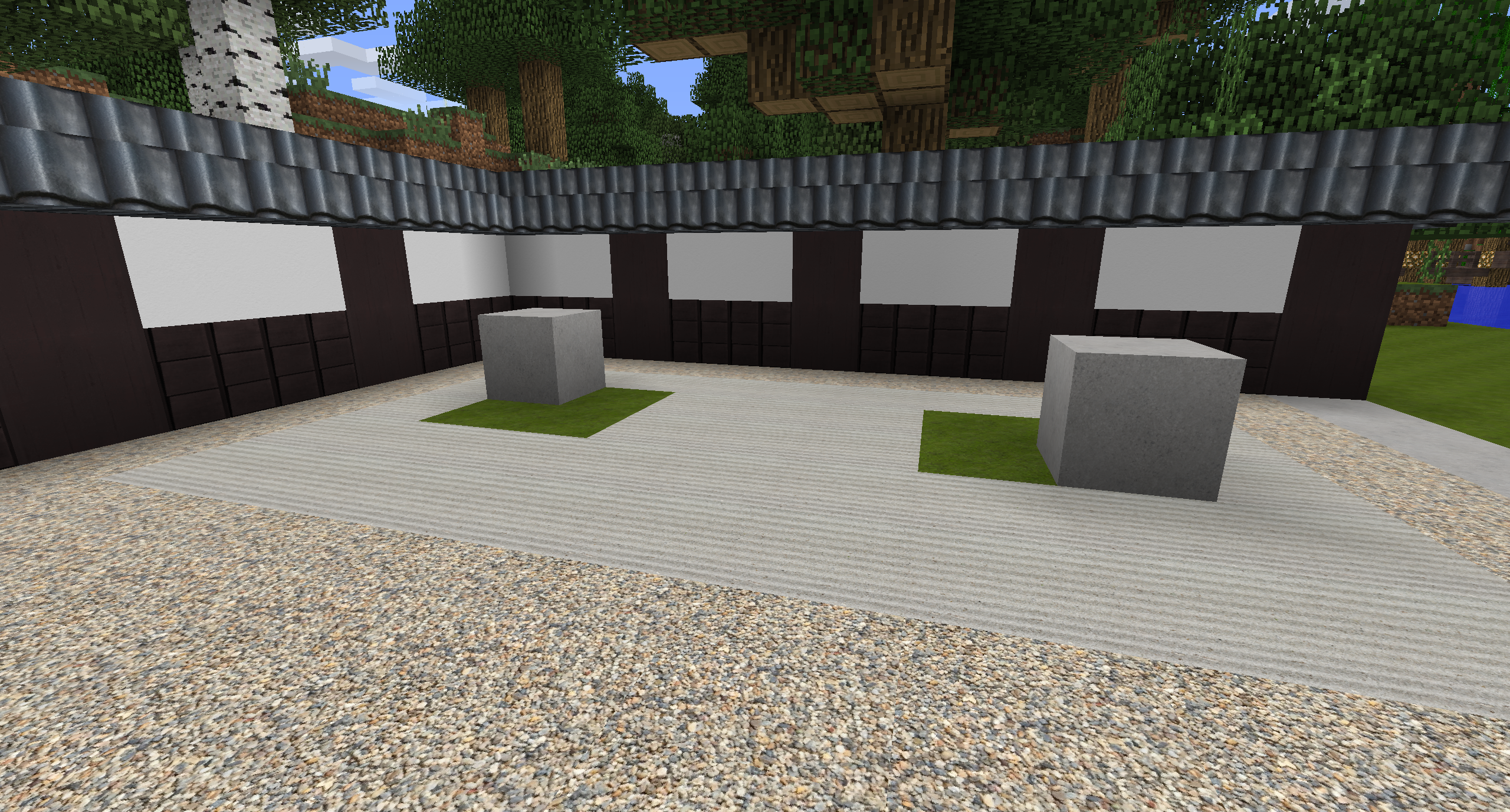 An example of a rock garden, easy to make yet elegant. Grey wool is used for the raked sand texture.