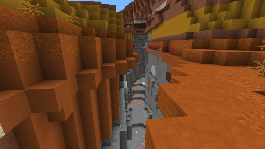 A ravine cutting through multiple layers of terracotta