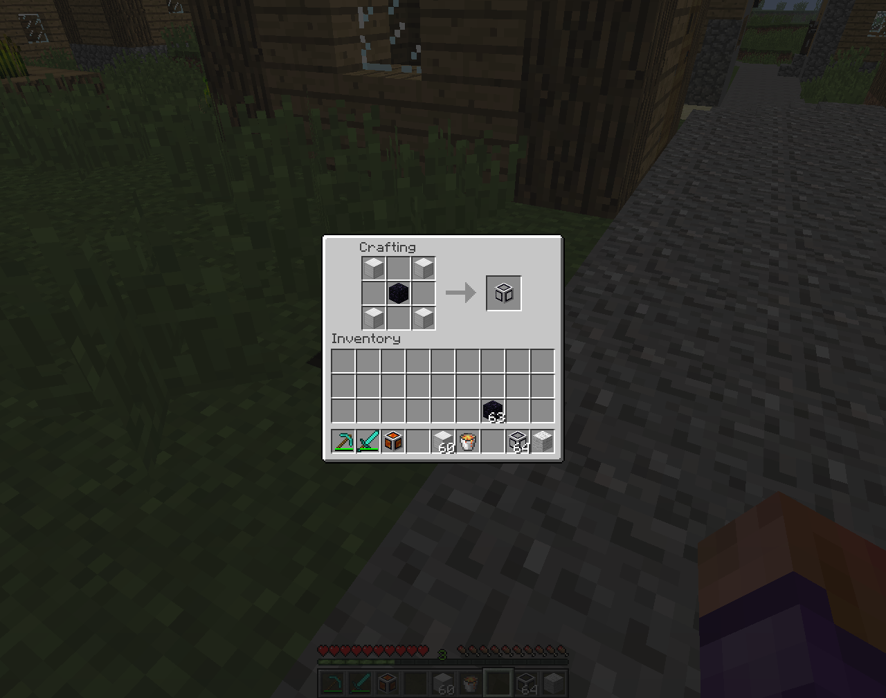 Four iron blocks with one obsidian.