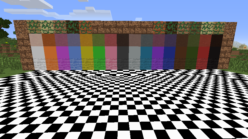 All the blocks in 1.0.0
On the floor, checker blocks
Up the sides of the wall, dirt bricks
Across the top, mossy wood planks and dirt bricks
In the centre, top and bottom are hardened clay and wool, with the simple blocks variant of each colour inside.