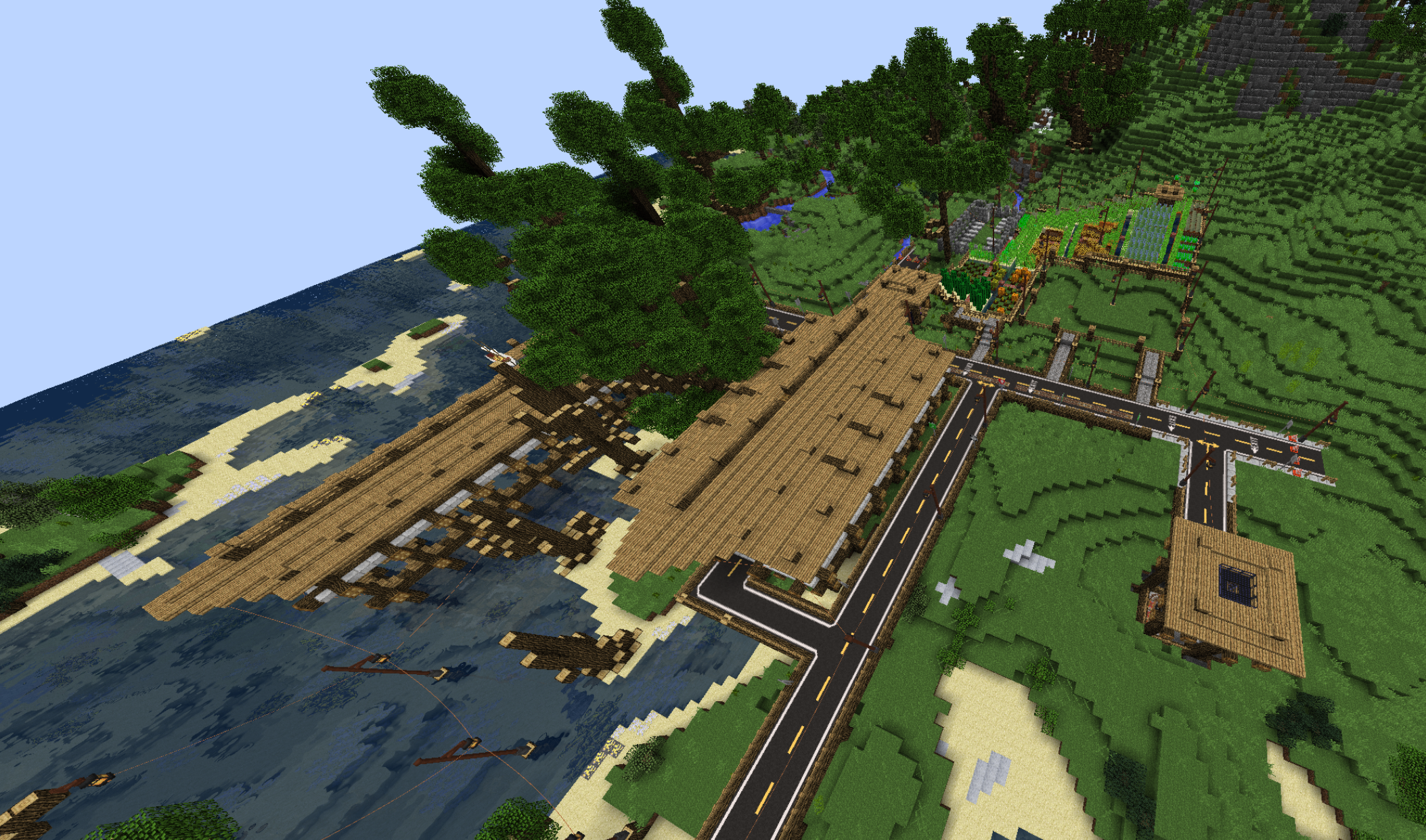 Just a few buildings full of Immersive Engineering galore inside; all built in survival on this modpack.