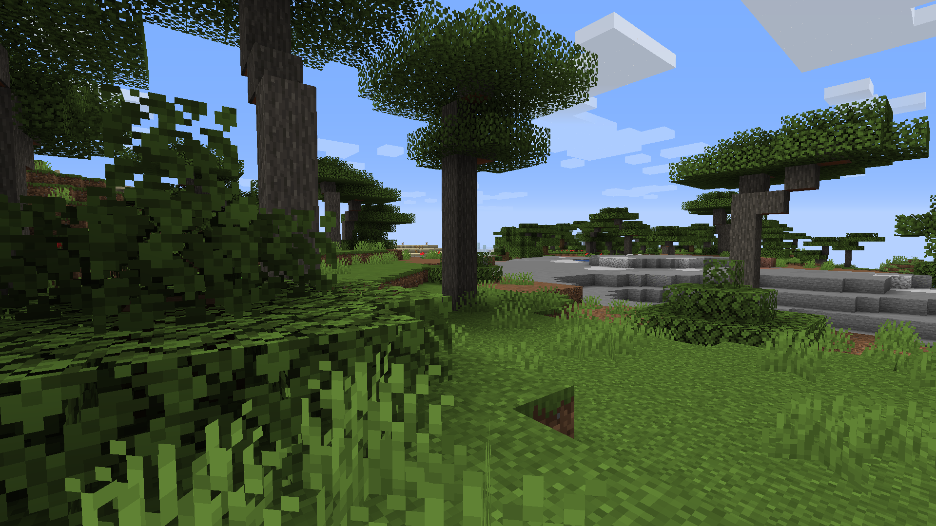A blend of all the savanna types with greener greenery. And shrubs.