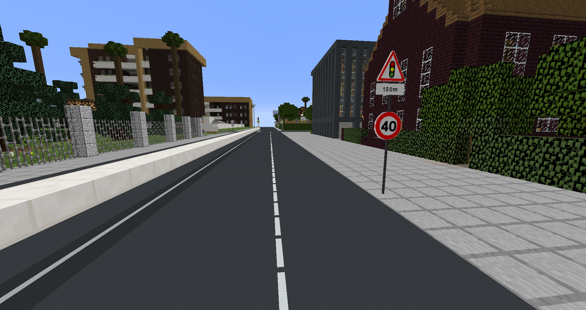 End of expressway with traffic lights
