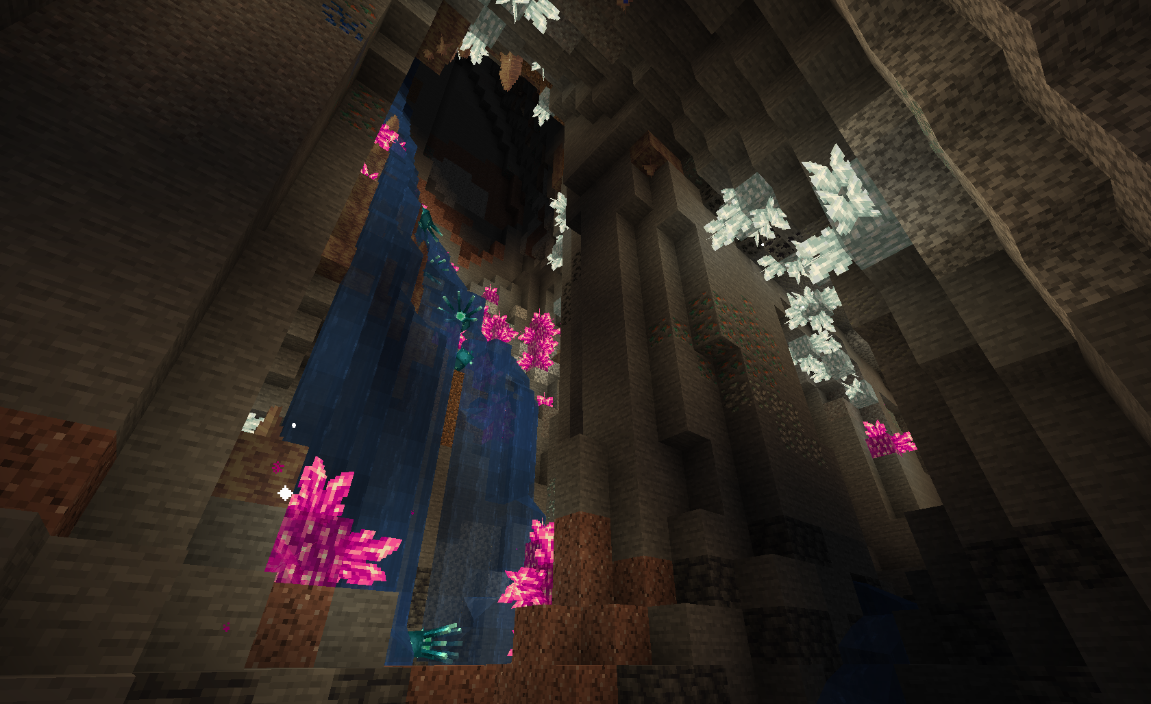 A massive sinkhole filled with glowing crystal blocks from Quark!