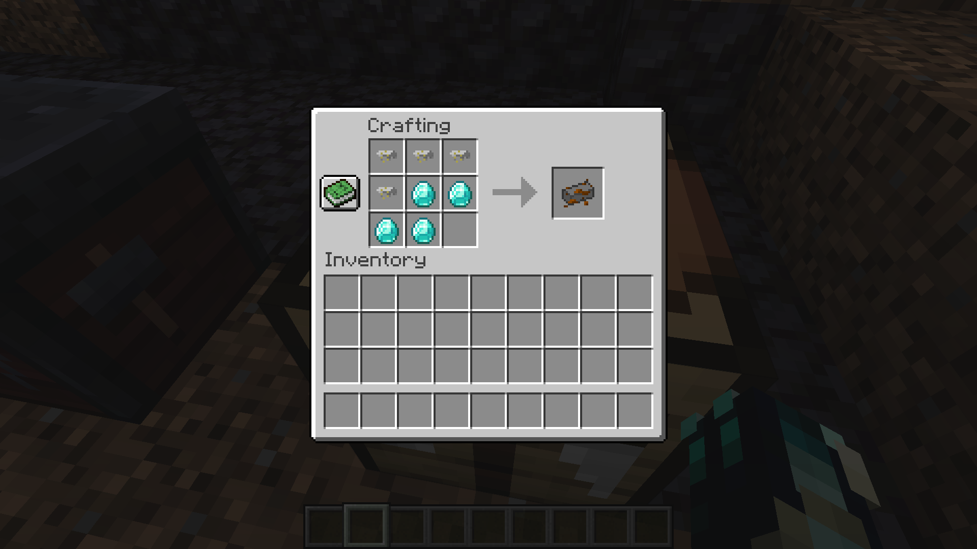 A crafting grid with diamonds and Crude Scraps
