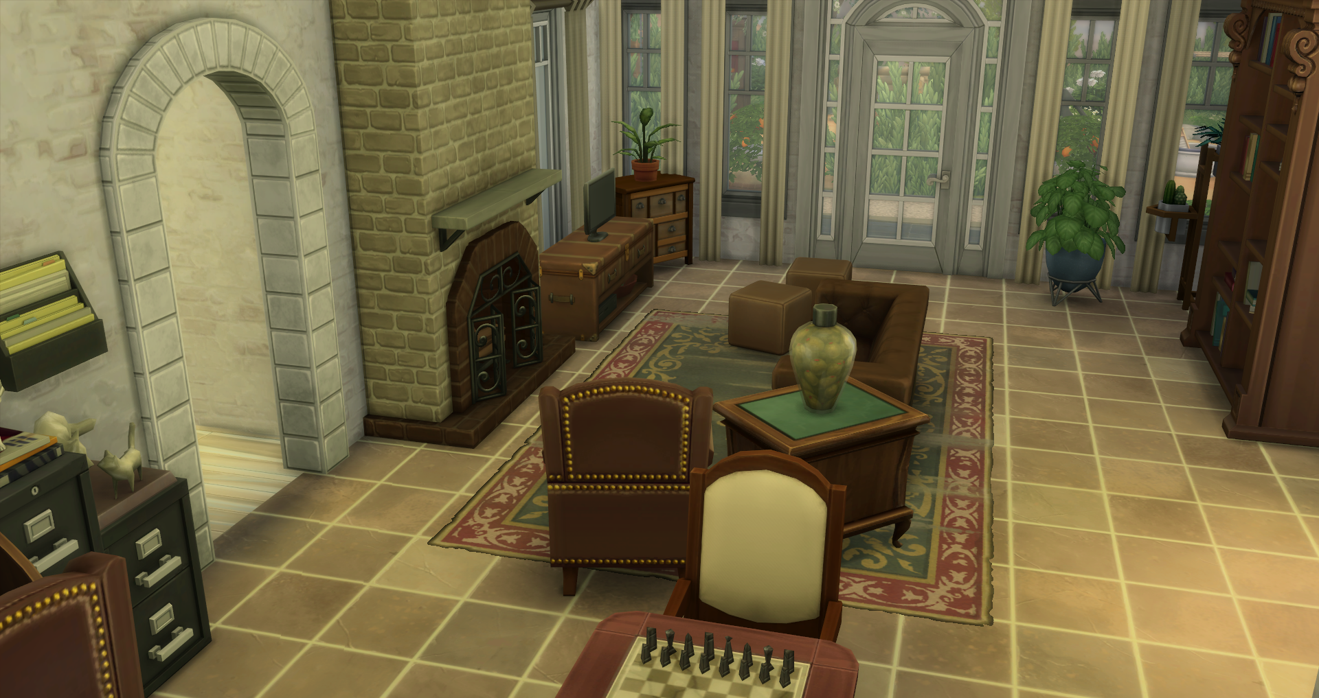 This darker toned office has plenty to do in it and includes a family area in front of the fire to watch tv, a half bath, along with activities.