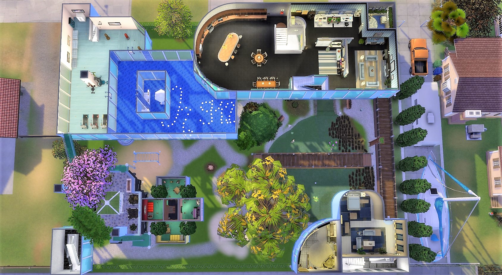 Top View of the 1st Floor with Fitness Area, Kitchen, Living Room, Master Bedroom, Master Bath, Children's Tree House, and Birthday Pool