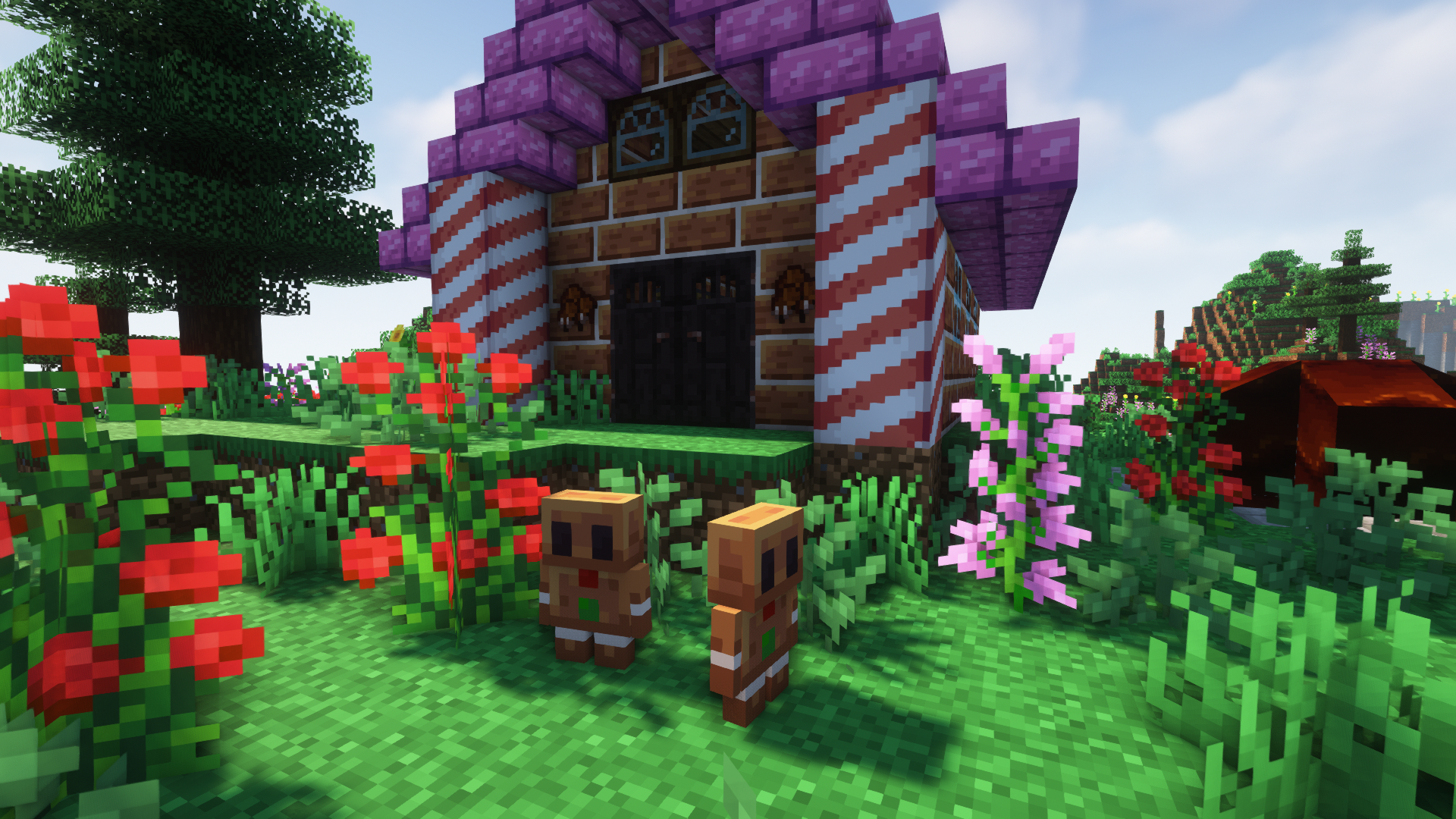 A house made from candy, built in a flower grove with gingerbread people out front