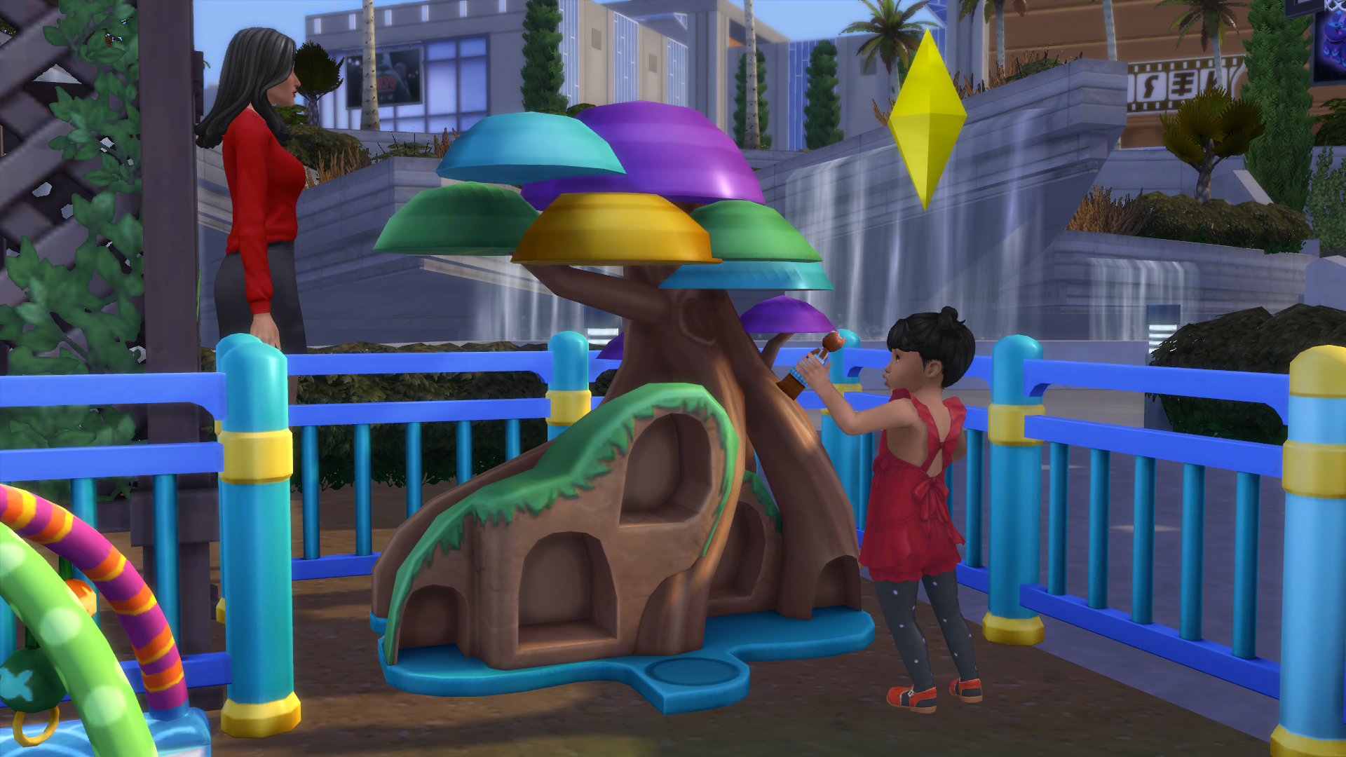 Cassandra playing with the dollhouse