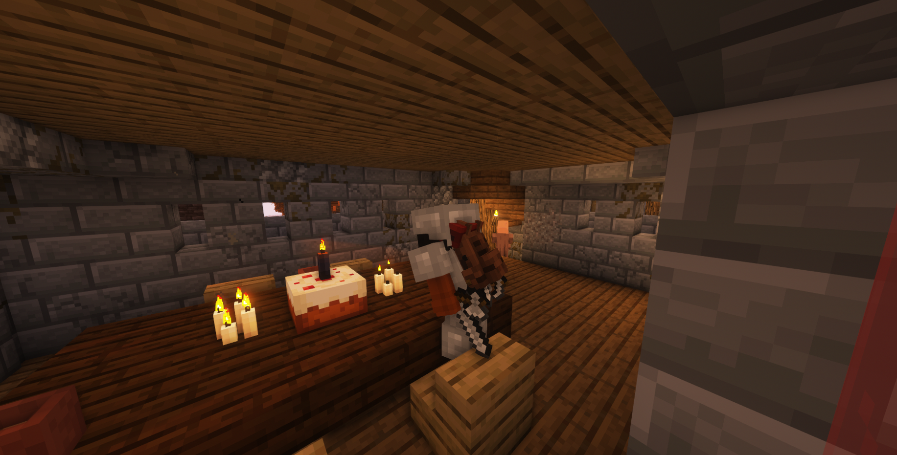 Tacho blowing out candles on a cake in a village tower