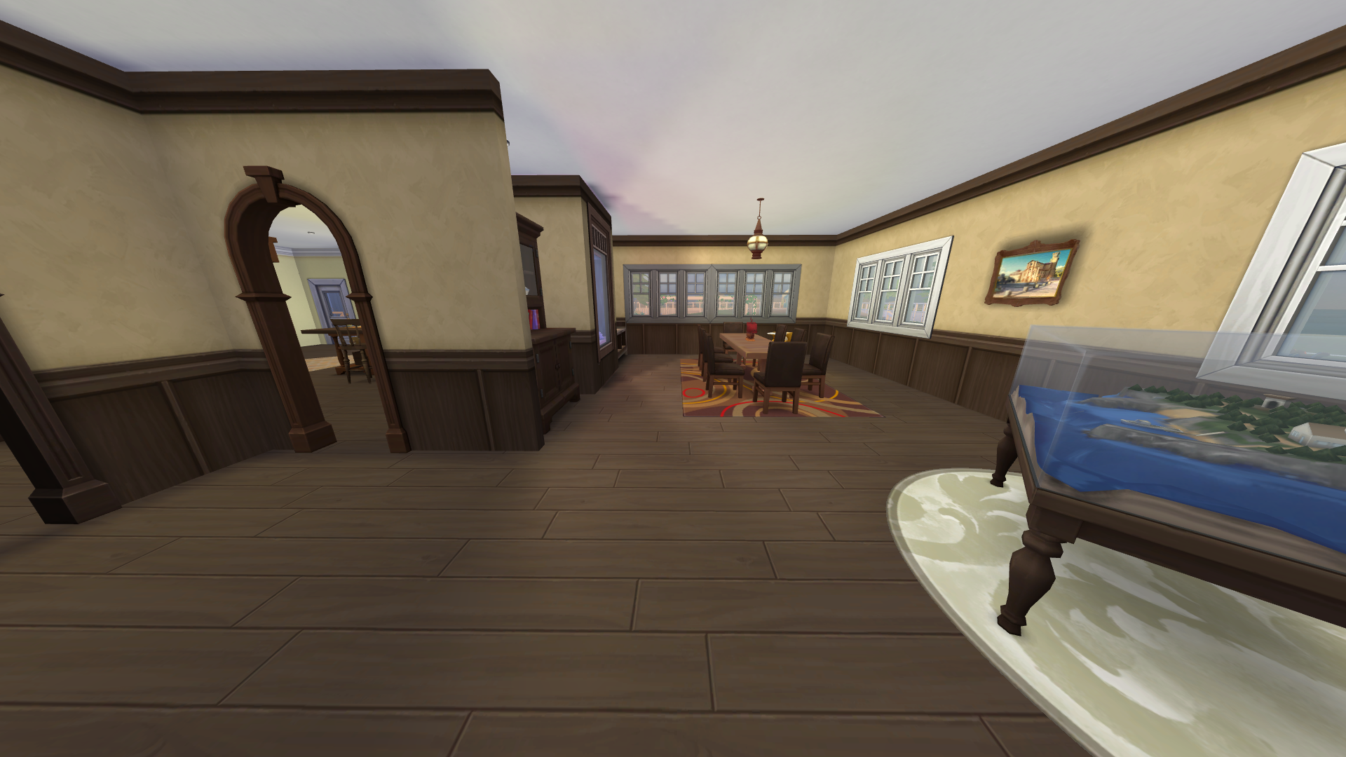 Thumbnail The dining room is generously sized and features a built-in fish tank