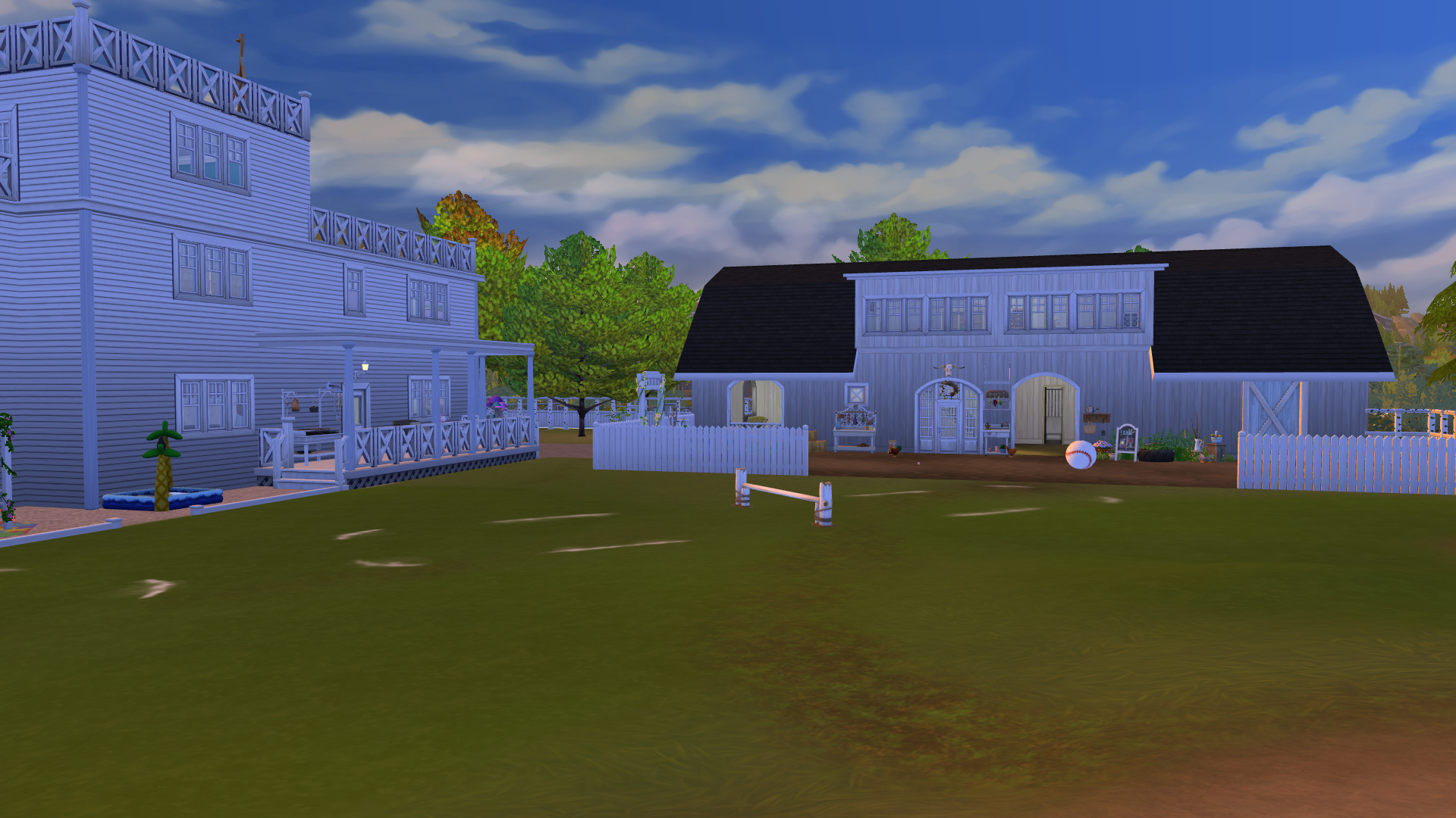 Thumbnail The rear property features a large two story barn with two stalls, plumbing and lighting, nectar making station, and more
