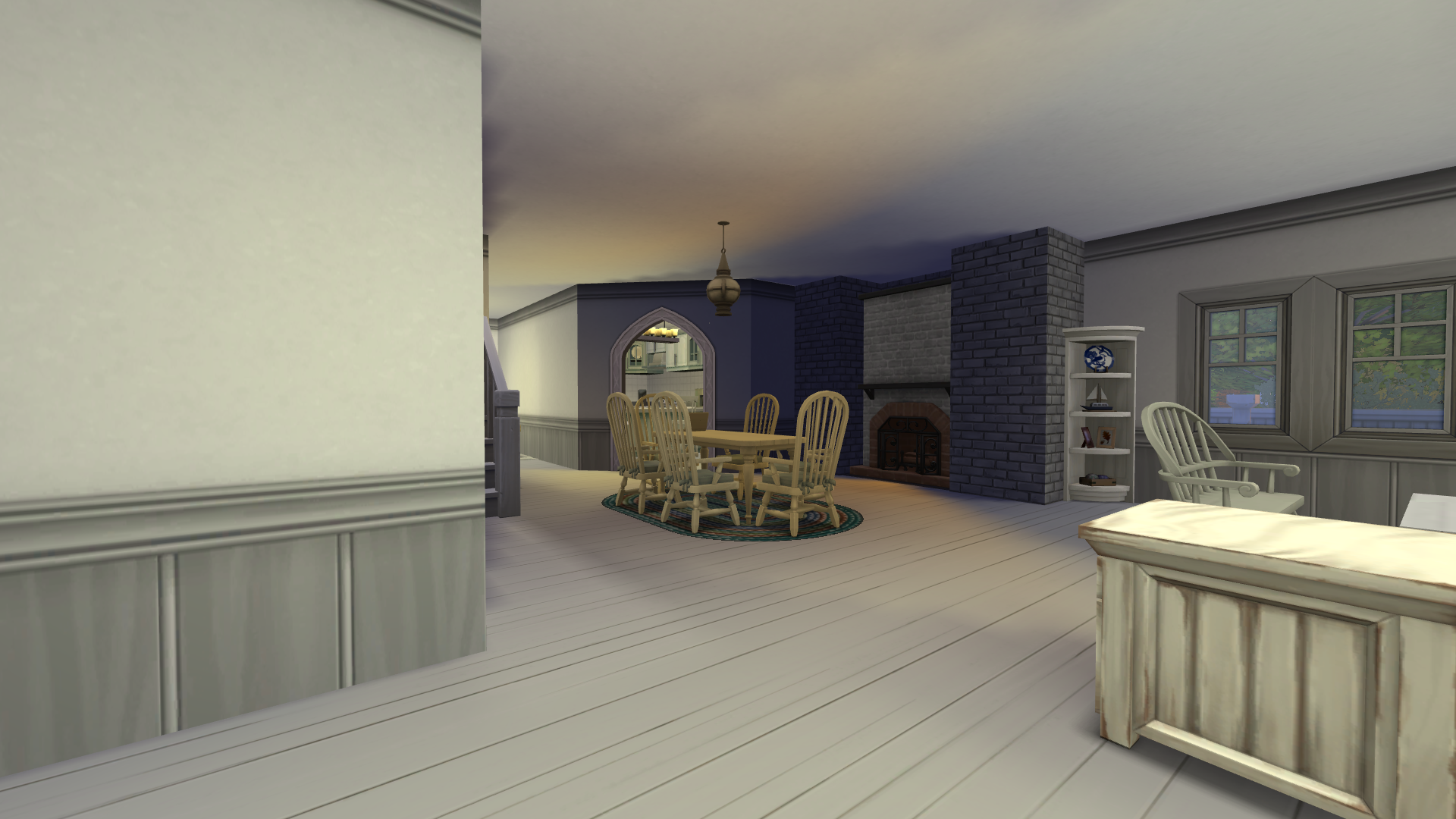 Thumbnail Entering the home you're greeted with the front sitting nook and the dining room, all trimmed neatly in white