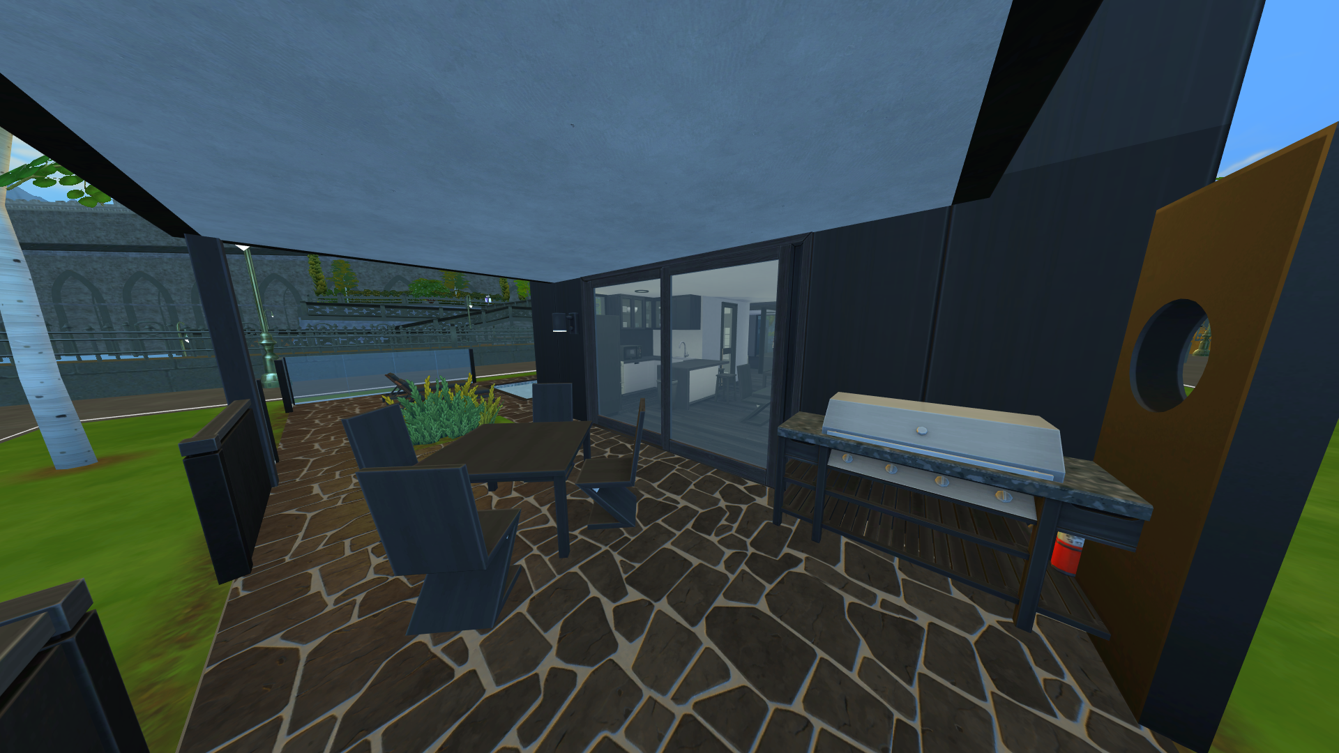 Thumbnail The rear covered deck has seating for 4, plus a BBQ grill