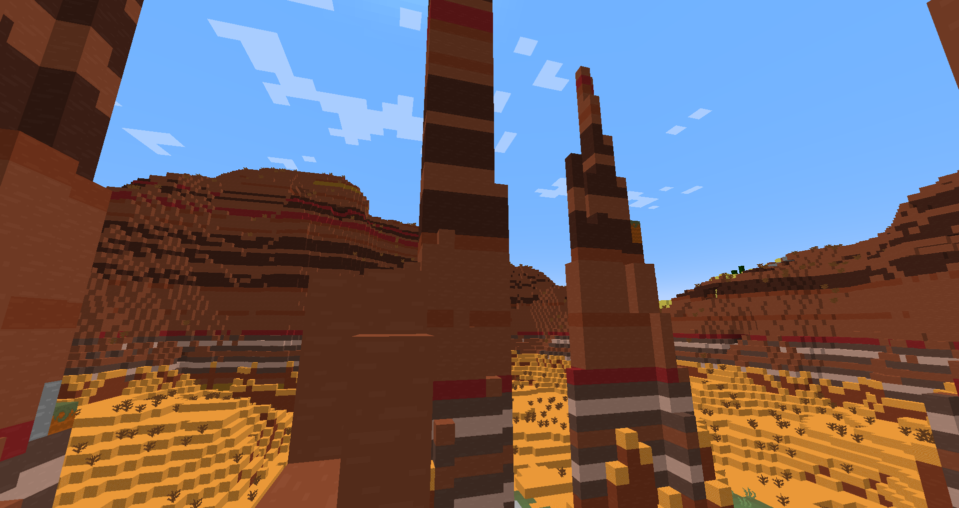 Thumbnail An eroded badlands biome with a plateau visible in the back