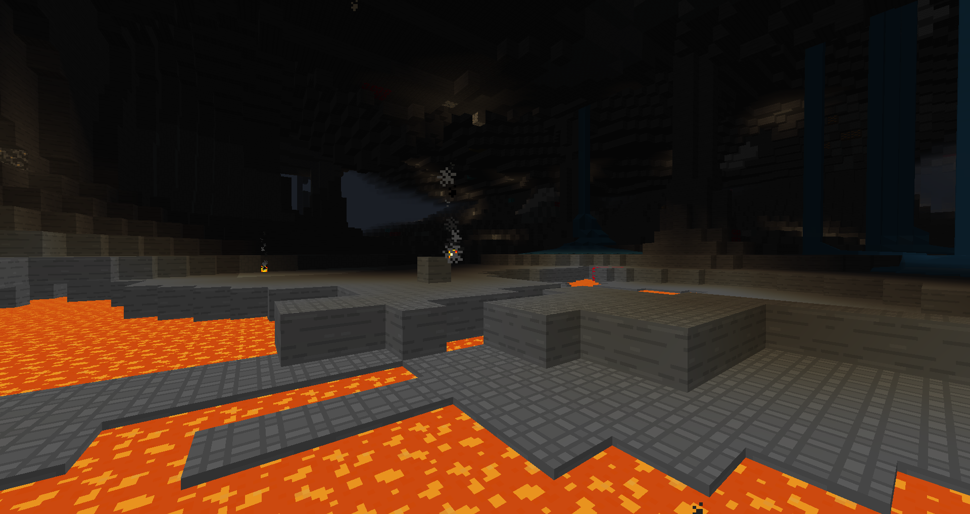 Thumbnail A cavern deep underground, filled with both lava and water.