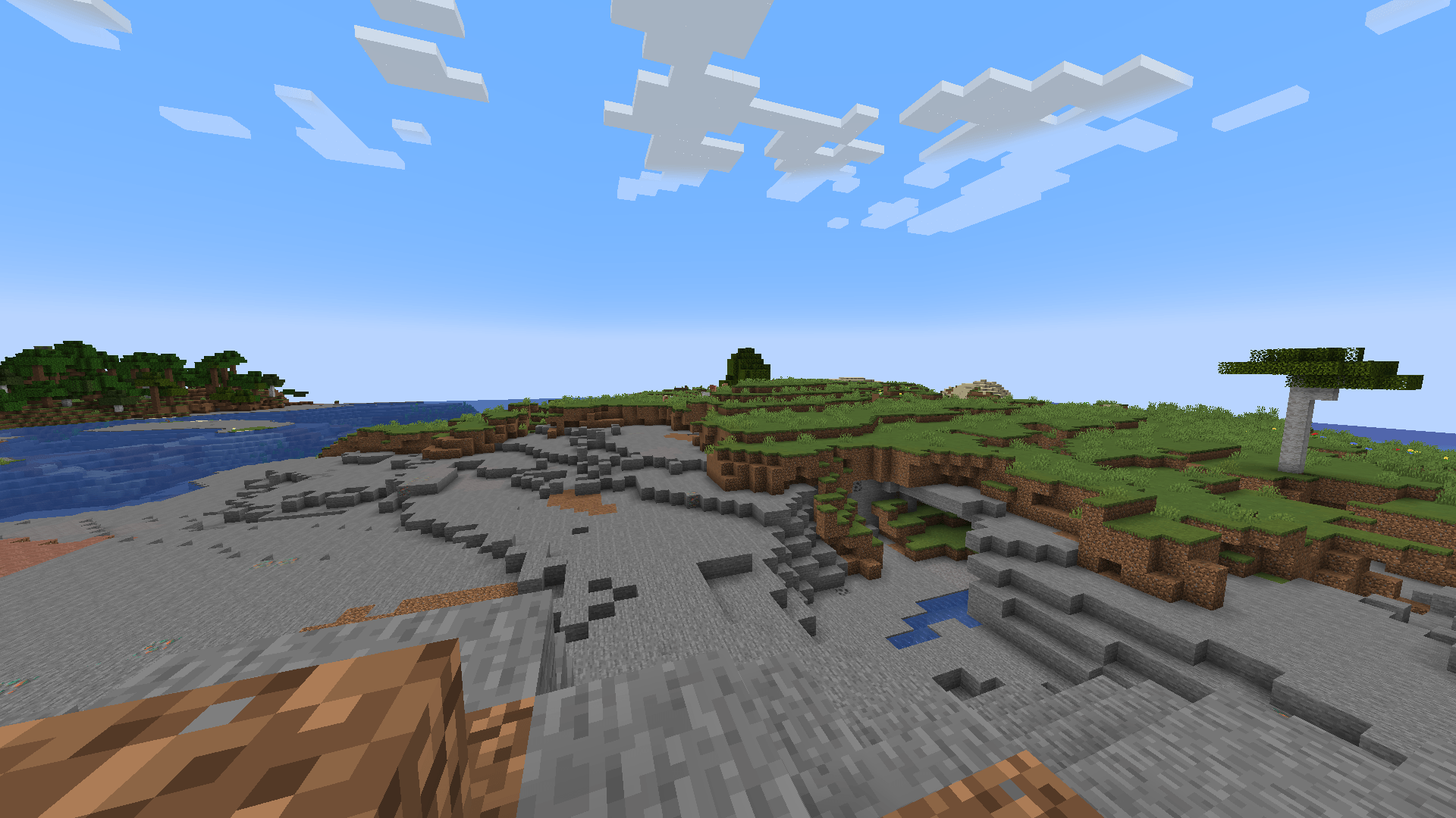 A view of the Stone Basin biome, with a eucalyptus tree in the plains behind it.