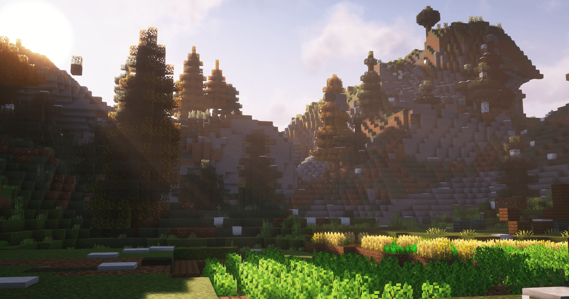 Thumbnail The rays of a new day shine over a peaceful valley.