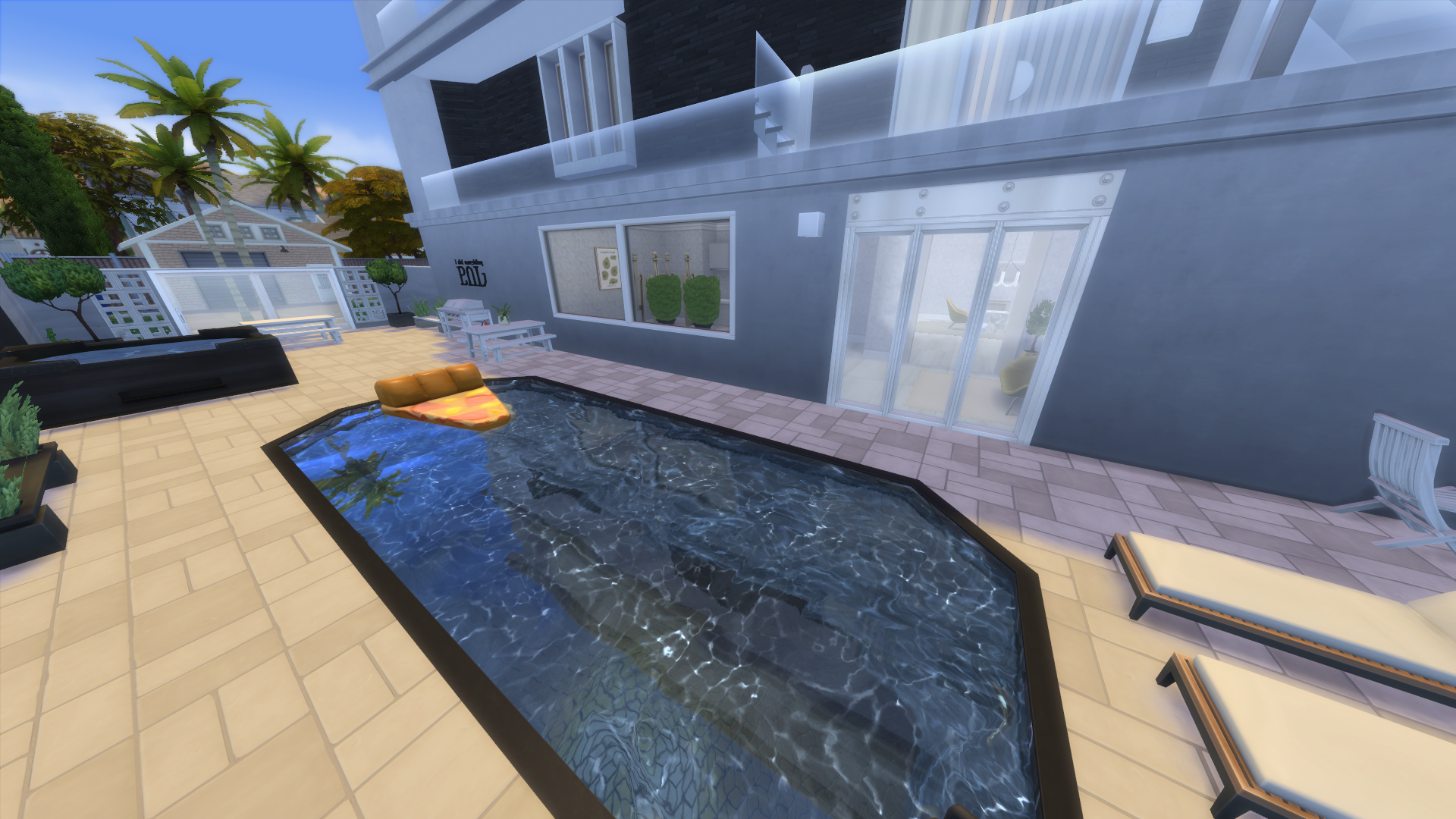 Thumbnail A large open oasis between the two buildings offers great spaces to sun, swim, and barbeque
