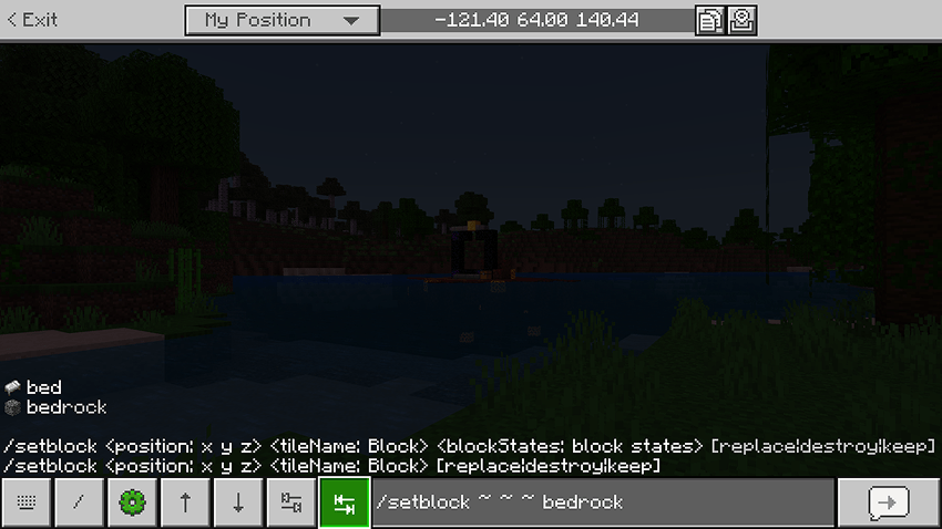 In-game screenshot showcasing the autocomplete feature. Text box content reads, “/setblock ~ ~ ~ bedrock”.