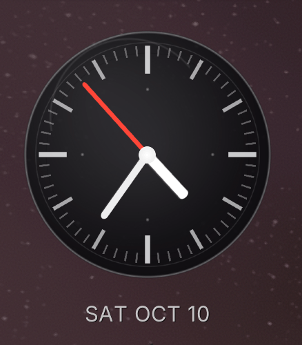 Analog clock face with date