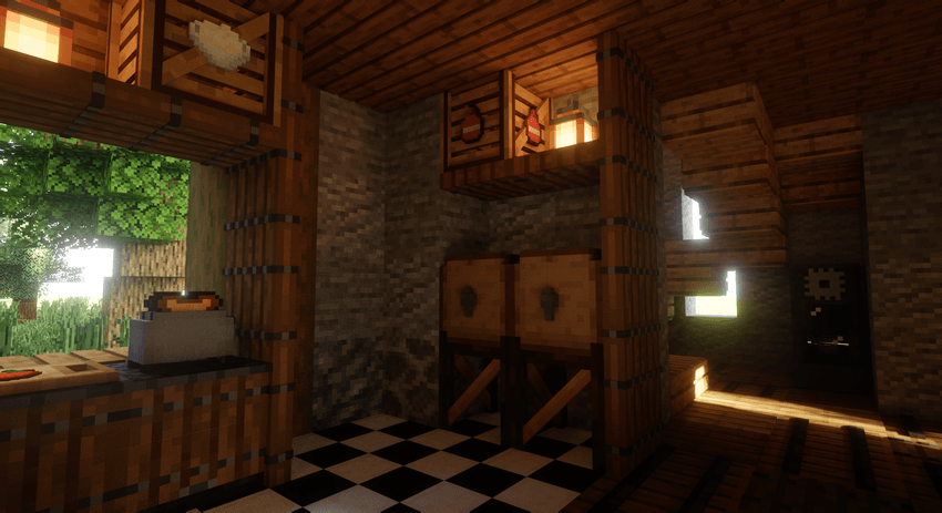 Minecraft rustic kitchen interior with a toaster by a large window overlooking lush green trees. The room features a black and white checkered floor, stone walls, and a wooden hanging shelf with a lit lantern and a crate holding maple syrup.. Two large wooden fermentation barrels on legs sit below the shelf. The adjacent entryway on the right has a grandfather clock and a spiral staircase leading up.