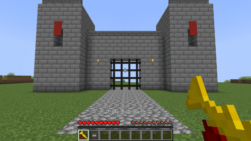 Blowing the gate trumpet from the road opens the whole castle gate, and blowing it again closes it
