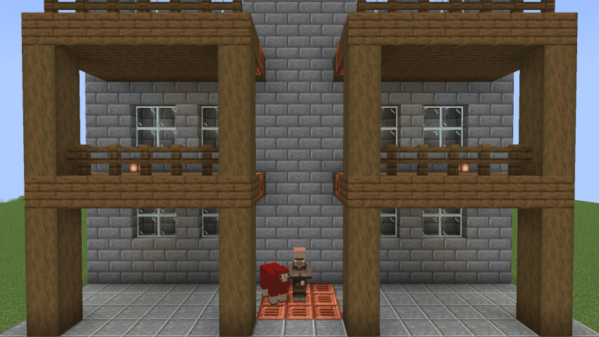 An elevator carrying a villager and a sheep up to the first floor, then on to the roof