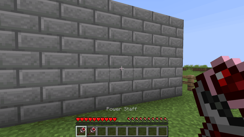 Pulling steps out of a brick wall with the power staff, then pulling one more block out and letting it drop