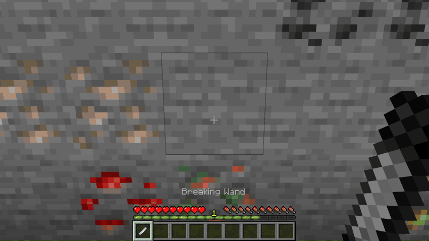 A Breaking Wand clicked on two corners of a block of stone and ore, which vanishes and leaves nothing behind