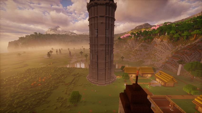 Hage village under the Grimoire Tower at sunset