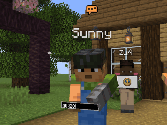 A player typing in chat with a speech bubble over the head