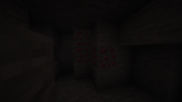 Ruby ore, slightly luminous.