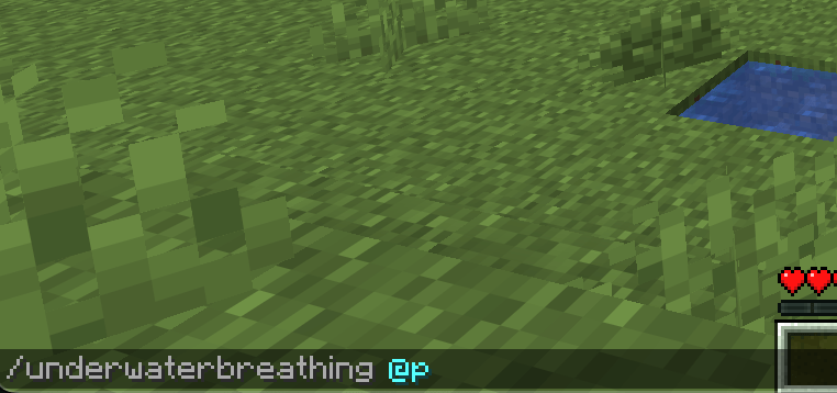 The Minecraft chat box opened with the command: '/underwaterbreathing @p' filled in the chat box.