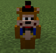 A Vintage Freddy Figurine.