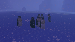 A huddle of penguins in a snowstorm