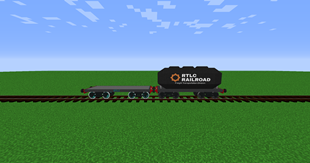 From The Left - RTLC Flatcar And RTLC Railroad Freight Transportation Division Tankcar