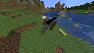 Medium Field Gun firing upon a village with spent shells nearby