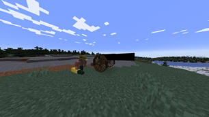 Player loading a shell into a heavy field gun.