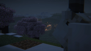 Goat overlooking village