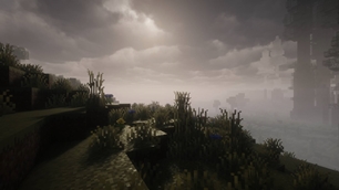 A misty Minecraft hillside glows softly beneath heavy clouds and dim morning light.