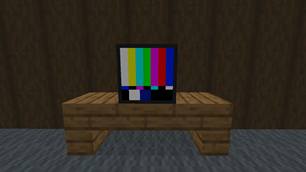 A TV on a desk.
