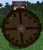 ShieldRoundNetheriteScrapInHand001.png