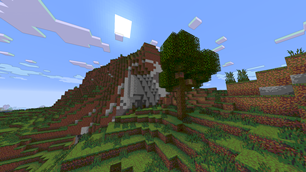 Tree behind a hill