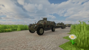 Otokar Cobra II and M1A1 Abrams.jpg