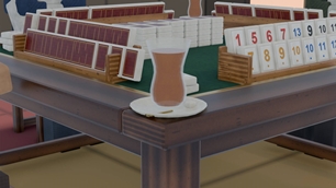 Cay in an ince belli bardak, with sugar and spoon