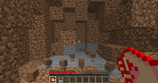 Using the God's Fist to instantly break blocks